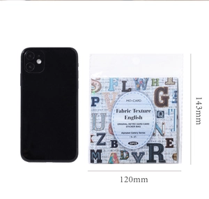 Detail view of 52-piece vintage fabric texture alphabet stickers next to a smartphone