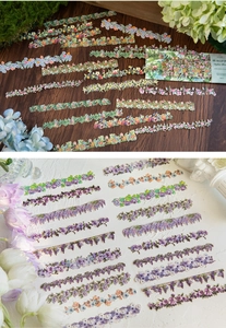 Vista macro di adesivi floreali a striscia lunga da 20 pezzi per scrapbooking