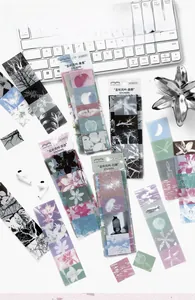 Macro view of matte PET aesthetic stickers featuring floral and nature photography themes