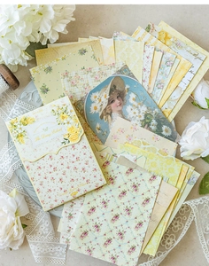 Detailed close-up of The Daisy Echo vintage scrapbook paper with floral and music notes