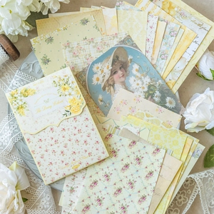 50 sheets of retro daisy themed scrapbooking paper with floral patterns for DIY decor