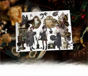 Detailed view of vintage art scrapbooking stickers featuring retro dark illustrations
