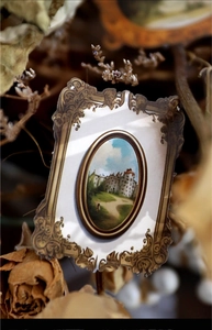 Close-up of vintage Baroque frame card with landscape oil painting for DIY journaling