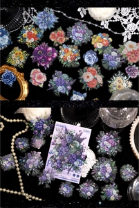Macro shot of realistic floral PET stickers with glitter finish and vintage art props