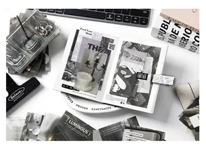 Detail of vintage monochrome scrapbooking kit with stickers and retro photography ephemera