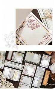 Makroansicht der silbernen Prägetexturen und Blumenmotive auf Vintage-Papier