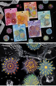 Macro detail of holographic firework stickers on a glass for DIY scrapbooking