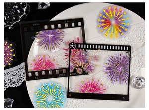 Macro detail of transparent PET fireworks stickers with retro film frames for DIY scrapbooking