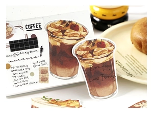 Detail shot of coffee theme stickers with hand-drawn latte art for diary decoration