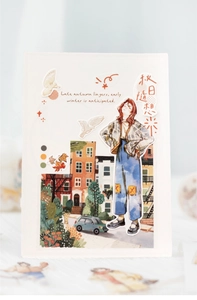 Close-up of autumn theme stickers with retro girl illustration and maple leaves detail