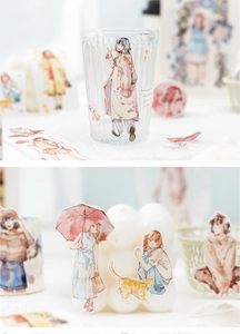 Macro detail of watercolor female figure stickers decorating glassware and candles