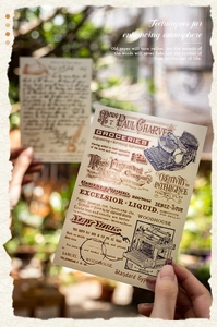 Detail of vintage manuscript transfer stickers featuring typewriter and retro typography