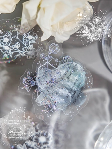 Close-up of clear PET floral stickers with laser glitter effect and quotes