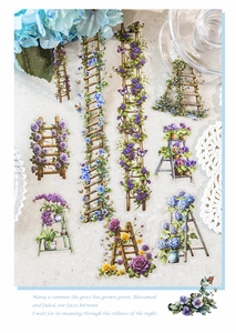 Macro shot of vintage floral ladder stickers and garden motifs for DIY journaling