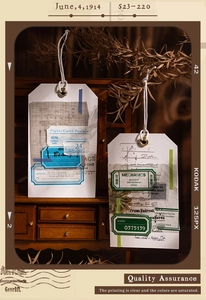 Detail of vintage scrapbook stickers featuring retro labels and old stamps on wooden drawers
