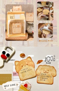 Detailed close-up of cute cartoon toast shaped sticky notes with cat and dog patterns