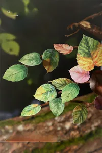 Macro detail of realistic leaf-themed stickers on a branch for DIY scrapbooking