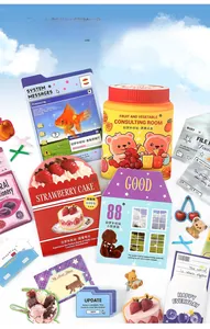 Detail of vintage scrapbooking stickers featuring retro bears, cakes, and creative icons