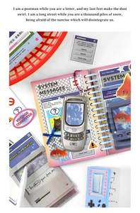 Macro view of vintage silver Y2K phone charm and scrapbooking system stickers