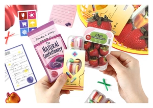Macro shot of creative snack-shaped vintage stickers for DIY scrapbooking decoration