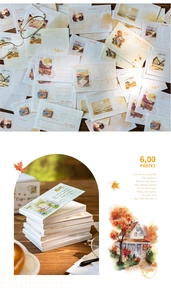 Detail of vintage stamp-style paper labels featuring watercolor architectural illustrations