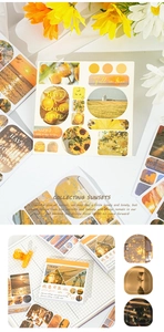 Detail showing sunset themed stickers with warm yellow landscapes and floral patterns