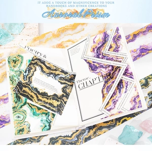 Detail of Aurora Prism washi tape with marble texture, gold foil, and quotes for DIY scrapbooking