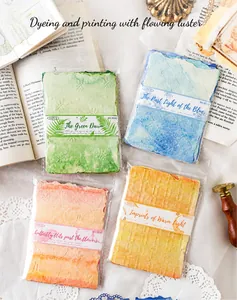 Detail of MUROO watercolor textured paper with irregular edges for DIY scrapbooking