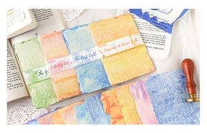 Detalle de textura de papel gofrado color macarrón para scrapbooking con bordes irregulares