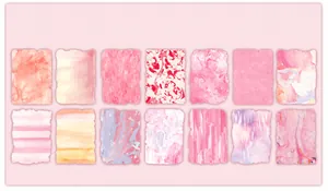 Pink watercolor and marble patterned scrapbooking paper sheets with hand-torn edges