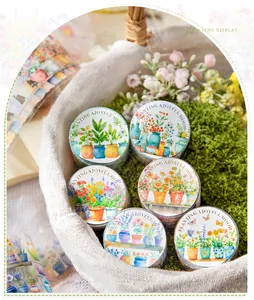 Detail of 6-roll plant and floral PET tape set for scrapbooking in a garden display