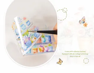 Close-up of watercolor botanical PET stickers with easy-peel pre-cut flower designs