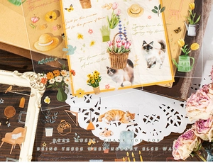 Détail d'autocollants PET vintage avec fleurs et chats dessinés à la main pour le scrapbooking