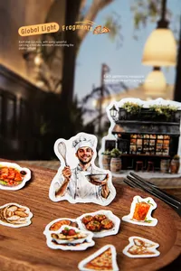 Macro shot of hand-drawn food stickers and chef illustrations on vintage wood tray