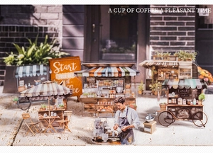 Detalle macro de pegatinas de café estilo acuarela con carrito y figuras de barista pro