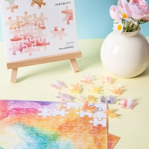 Set di adesivi puzzle acquerello fai-da-te con frammenti colorati e confezione estetica
