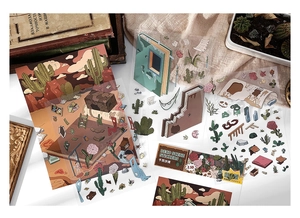 Macro detail of 2.5D desert themed PET deco stickers for DIY journaling scrapbooking