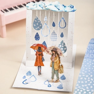 Kit decorativo in carta 3D a tema pioggia per scrapbooking con nuvole blu e figurine di ragazze
