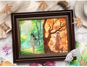 Detailed 3D paper carving art depicting forest seasons inside a vintage wooden frame