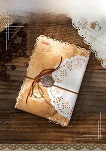 Detail of vintage coffee-themed lace paper stationery with retro seal and leather cord