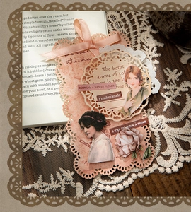 Detail of vintage lace paper with pink ribbon bow and retro stickers for scrapbooking