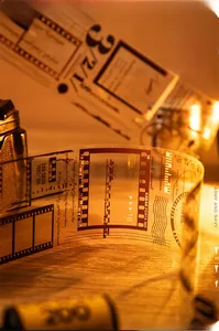 Close-up of vintage PET film tape featuring Kodak film frame designs for scrapbooking