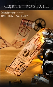 Detail of vintage film style PET tape with seasonal prints and retro camera props