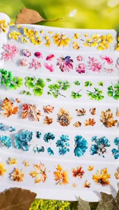 Macro detail of laser PET decorative tape with autumn leaf shapes and glitter finish