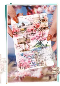 Close-up of watercolor cherry blossom PET stickers for DIY scrapbooking and journal decor