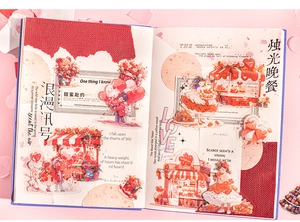 Close-up of Valentine themed PET stickers on a notebook with romantic floral patterns