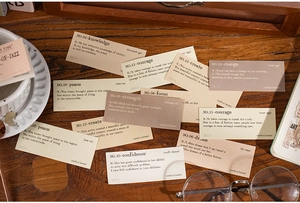 Detailed close-up of retro English vocabulary ephemera labels for vintage scrapbooking art