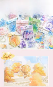 Macro detail of dreamlike PET stickers featuring hot air balloons and clouds for journaling