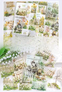 Detail of floral PET stickers with sunflowers and cats for creative journaling decoration