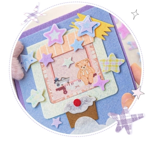 Nahaufnahme des DIY 3D Filzaufklebers mit Teddybär und bunten Sternen-Patches